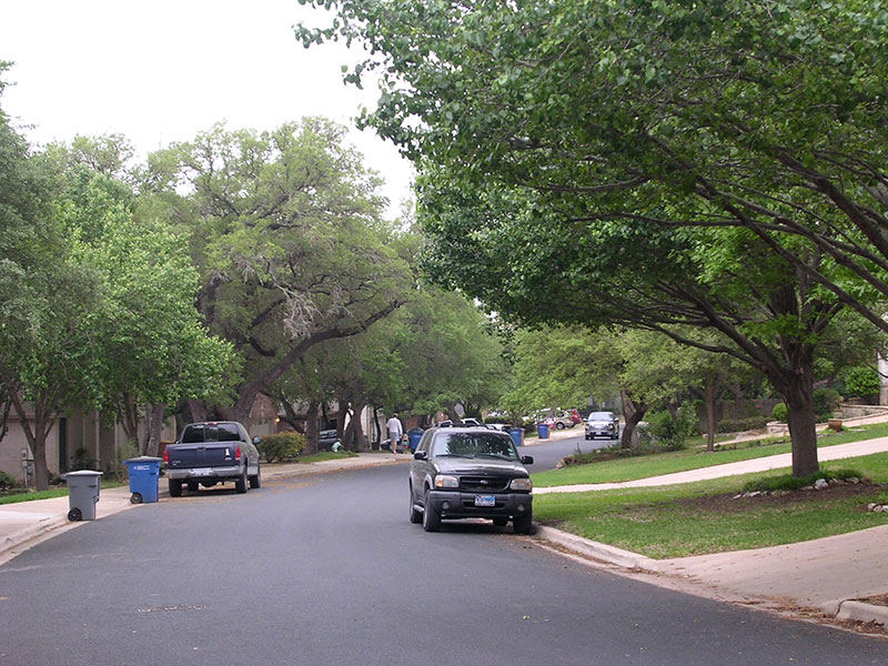 A residential street I often ride. Cars parked on each side can be a problem if there's traffic -- which there often is not.
