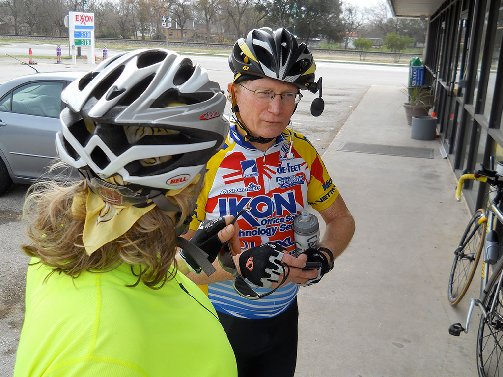 At the Buda rest stop, Maggie and Jim talk about their gym workouts .