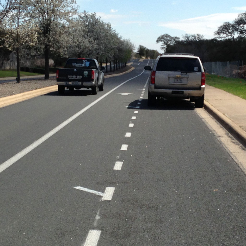 The door zone stripes aren't obvious, but bike riders should be able to spot them easily.